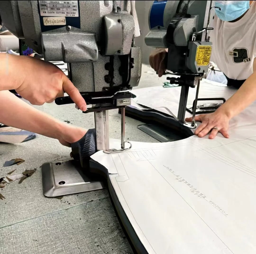 Technical team discussing at digital cutting table